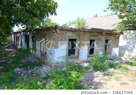 Collapsed industrial building in daytime 106617560