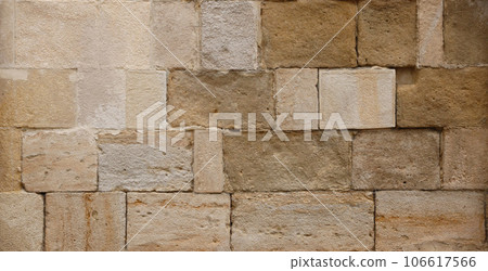 Texture of stone wall with many big brown stones 106617566