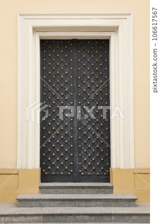 Old ancient metal door texture in european medieval style Old ancient metal door texture in european medieval style 106617567