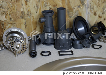 Tools and water tap ready for installation sink on countertop Tools and water tap ready for installation sink on countertop 106617606