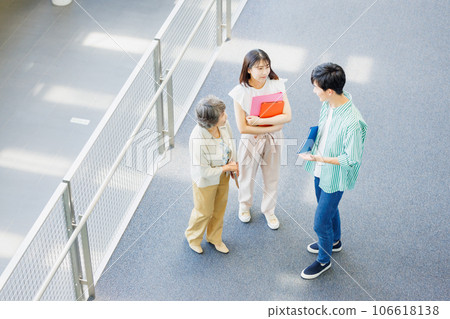 University student, professor, campus image 106618138