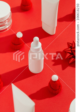 Pattern with cosmetics on red background. Christmas Valentines Day sale concept Pattern with cosmetics on red background. Christmas Valentines Day sale concept 106618230