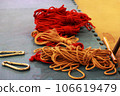 Skeins of 6 mm jute rope for Japanese bondage and shibari, colored red and undyed. Skein of professional knitting. 106619479