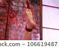 Leg of a beautiful girl tied with red rope. shibari performance reportage shooting. 106619487