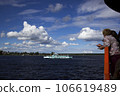 tourist sailing on a ferry along the Neva River to Shlisselburg and the Oreshek fortress 106619489
