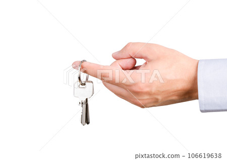 Man holding house keys, white background Man holding house keys, white background 106619638