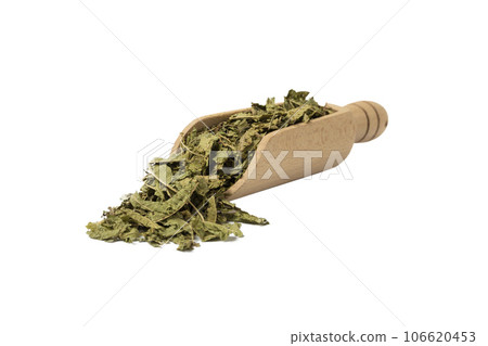 Dried leaves o Lemon verbena in latin Aloysia citrodora in wooden scoop isolated on white background. Medicinal herb. 106620453
