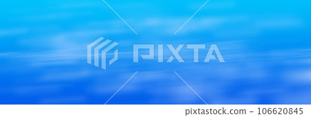 Blue background with fuzzy white glows in panoramic frame. 106620845