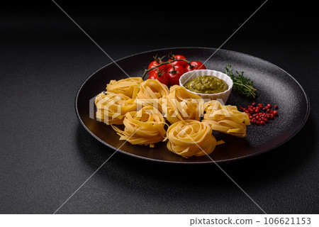 Delicious fresh pasta consisting pesto sauce with salt, spices and herbs 106621153