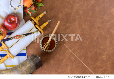 Central tradition of Rosh Hashanah is sounding shofar rams horn, symbolizing call to repentance spiritual awakening. Central tradition of Rosh Hashanah is sounding shofar rams horn, symbolizing call to repentance spiritual awakening. 106621450