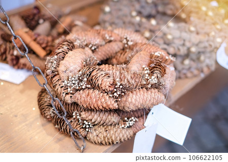 Handcrafted Christmas wreaths at a European Cristmas market Handcrafted Christmas wreaths at a European Cristmas market 106622105