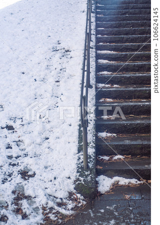Snow piled stairs 106624145