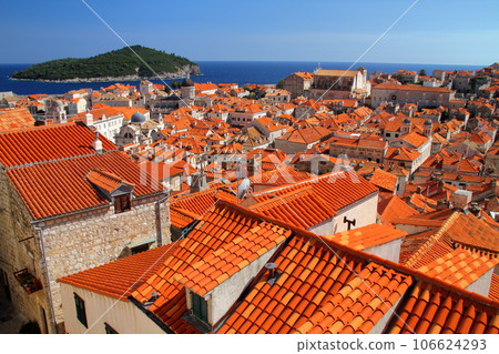 Croatia's world cultural heritage, the pearl of the Adriatic Sea, Dubrovnik - the old town with its bright orange roofs seen from the city walls 106624293