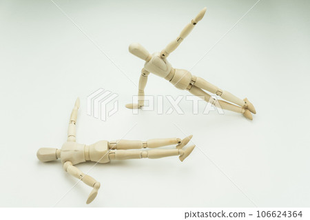 Drawing doll: A person who fell down while practicing yoga Drawing doll: A person who fell down while practicing yoga 106624364