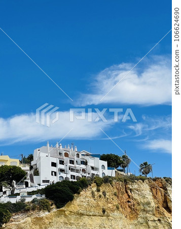 View of Carvoeiro fishing village with beautiful beach, Algarve View of Carvoeiro fishing village with beautiful beach, Algarve 106624690