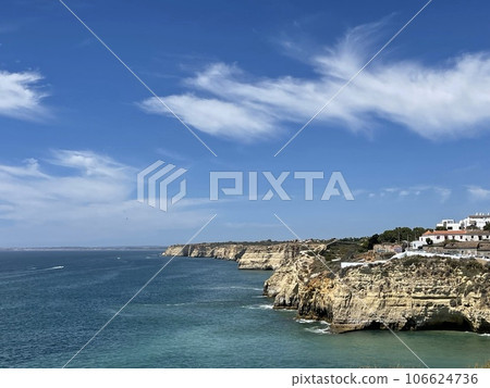 View of Carvoeiro fishing village with beautiful beach, Algarve 106624736