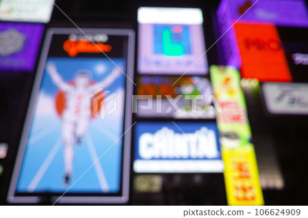 Scenery with signboards of tourist spots along the Dotonbori River in Namba, Osaka at night (blurred) Scenery with signboards of tourist spots along the Dotonbori River in Namba, Osaka at night (blurred) 106624909