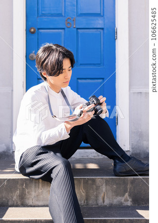 Camera and male 106625485