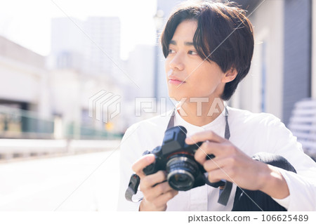 Camera and male Camera and male 106625489