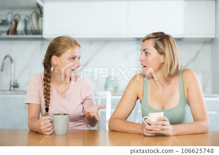 During tea party, mom talk to teen girl, listen to frank story about childs relationship with friend During tea party, mom talk to teen girl, listen to frank story about childs relationship with friend 106625748