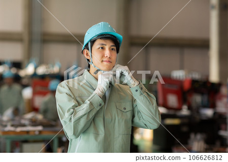 worker at work in a factory worker at work in a factory 106626812