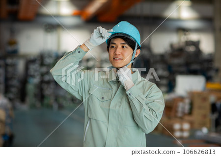 worker at work in a factory worker at work in a factory 106626813