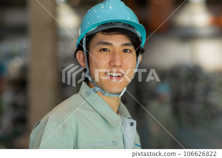 Young man in work clothes Factory 106626822