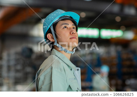 Young man in work clothes Factory 106626825