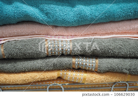 pile of gray and white color shower towel  106629030