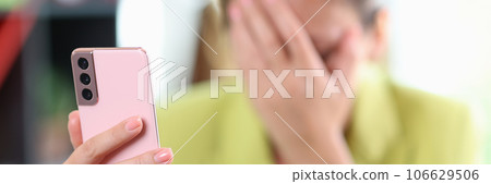 Female hand holding modern smartphone in hand 106629506