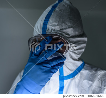 Men in protective clothing for infectious disease control 106629666