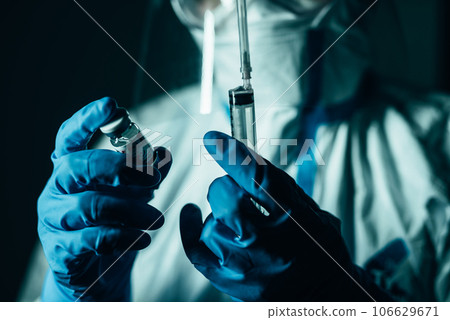 Men in protective clothing for infectious disease control Men in protective clothing for infectious disease control 106629671