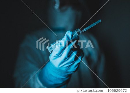 Men in protective clothing for infectious disease control Men in protective clothing for infectious disease control 106629672