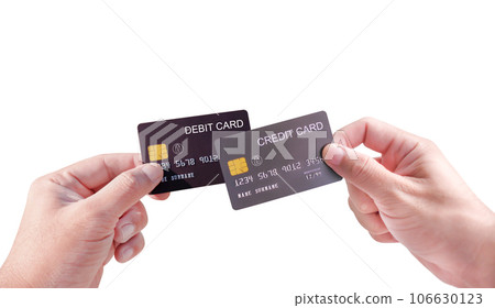 Hand holding credit and debit cards isolated on white background, Credit or debit card concept. Hand holding credit and debit cards isolated on white background, Credit or debit card concept. 106630123