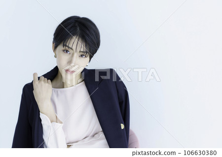 Fashion portrait of young woman on white background 106630380