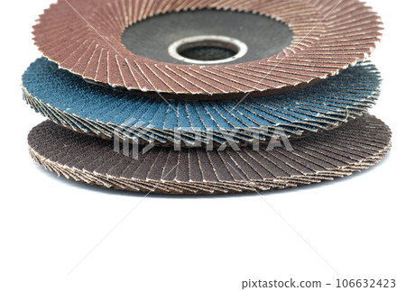 Flap discs for angle grinders in close-up over white Flap discs for angle grinders in close-up over white 106632423