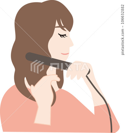 A woman using a hair iron A woman using a hair iron 106632882