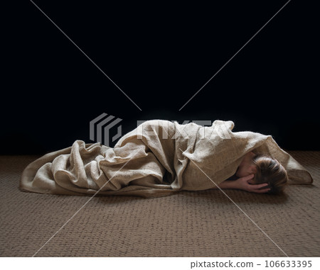 Sad girl lying on the floor Sad girl lying on the floor 106633395