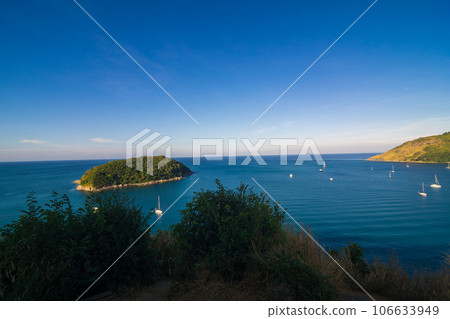 Landscape of sea with mountan island and white boat 106633949