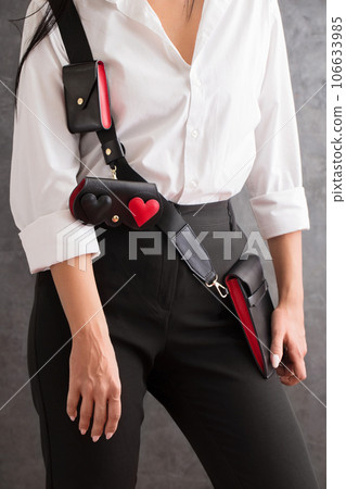Woman with smartphone bag, glasses case and a wallet for credit cards Woman with smartphone bag, glasses case and a wallet for credit cards 106633985