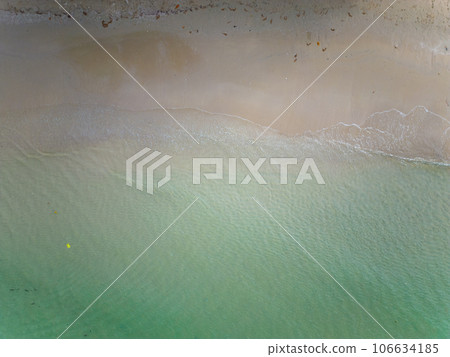White sand beach sea wave turquoise water summer vacation concept 106634185