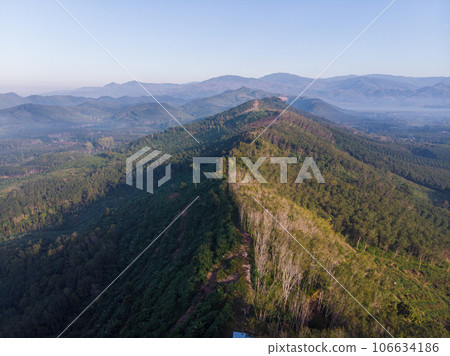 Aerial view mountain sunrise with fog sunrise light morning Aerial view mountain sunrise with fog sunrise light morning 106634186