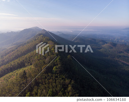 Aerial view mountain sunrise with fog sunrise light morning 106634188