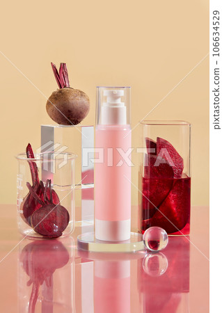 Mockup scene for advertising cosmetic with empty bottle decorated with beetroots, glassware and glass podium on beige background. Beetroot contains many important nutrients, good for health and beauty Mockup scene for advertising cosmetic with empty bottle decorated with beetroots, glassware and glass podium on beige background. Beetroot contains many important nutrients, good for health and beauty 106634529