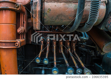 Excavator part repaire in fix shop old engine Excavator part repaire in fix shop old engine 106635395