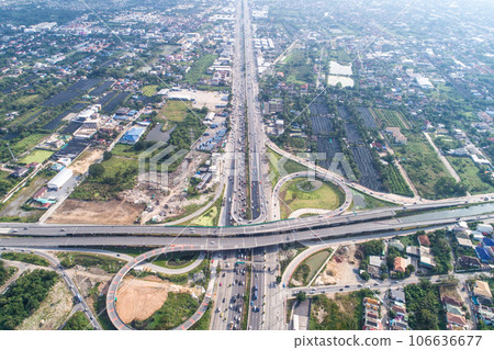 Traffic road junction view from above with green tree 106636677