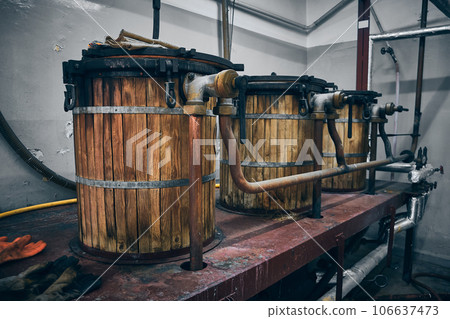 Old wooden wine production tanks Old wooden wine production tanks 106637473