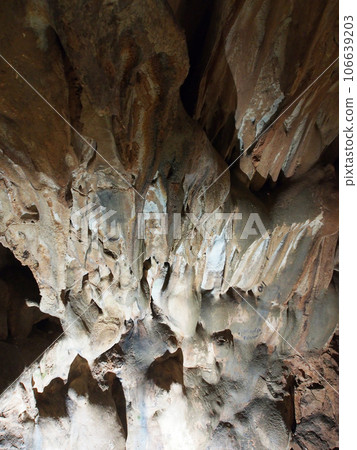 Under the ground. Beautiful view of stalactites and stalagmites in an underground cave-Skelskaya cave, South-West of Crimea. Speleology, the concept of active recreation, extreme travel. Under the ground. Beautiful view of stalactites and stalagmites in an underground cave-Skelskaya cave, South-West of Crimea. Speleology, the concept of active recreation, extreme travel. 106639203