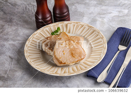 Roasted red tuna steak in the plate Roasted red tuna steak in the plate 106639632