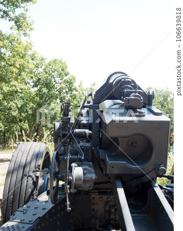 German battery of heavy howitzers in the firing position. Weapons of the second world war, historical reconstruction. German battery of heavy howitzers in the firing position. Weapons of the second world war, historical reconstruction. 106639818